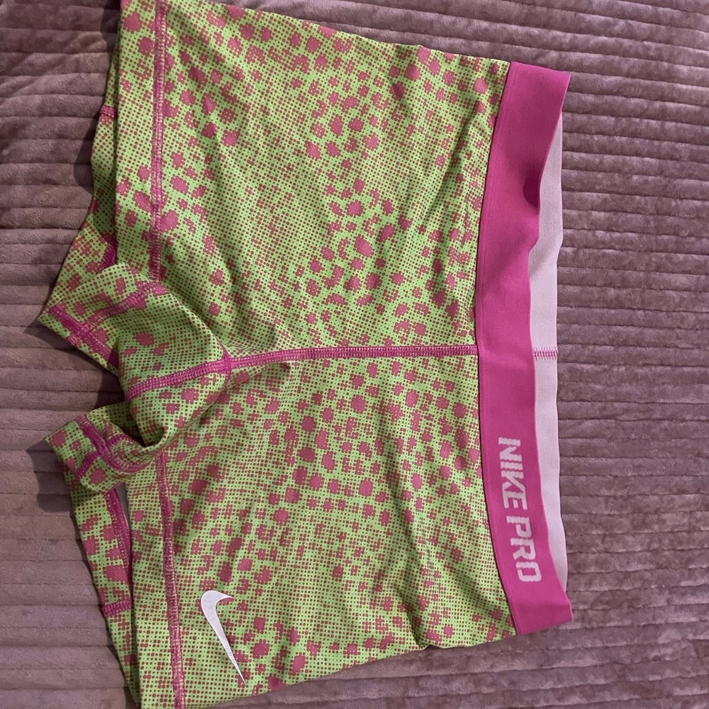 pink and green nike pros